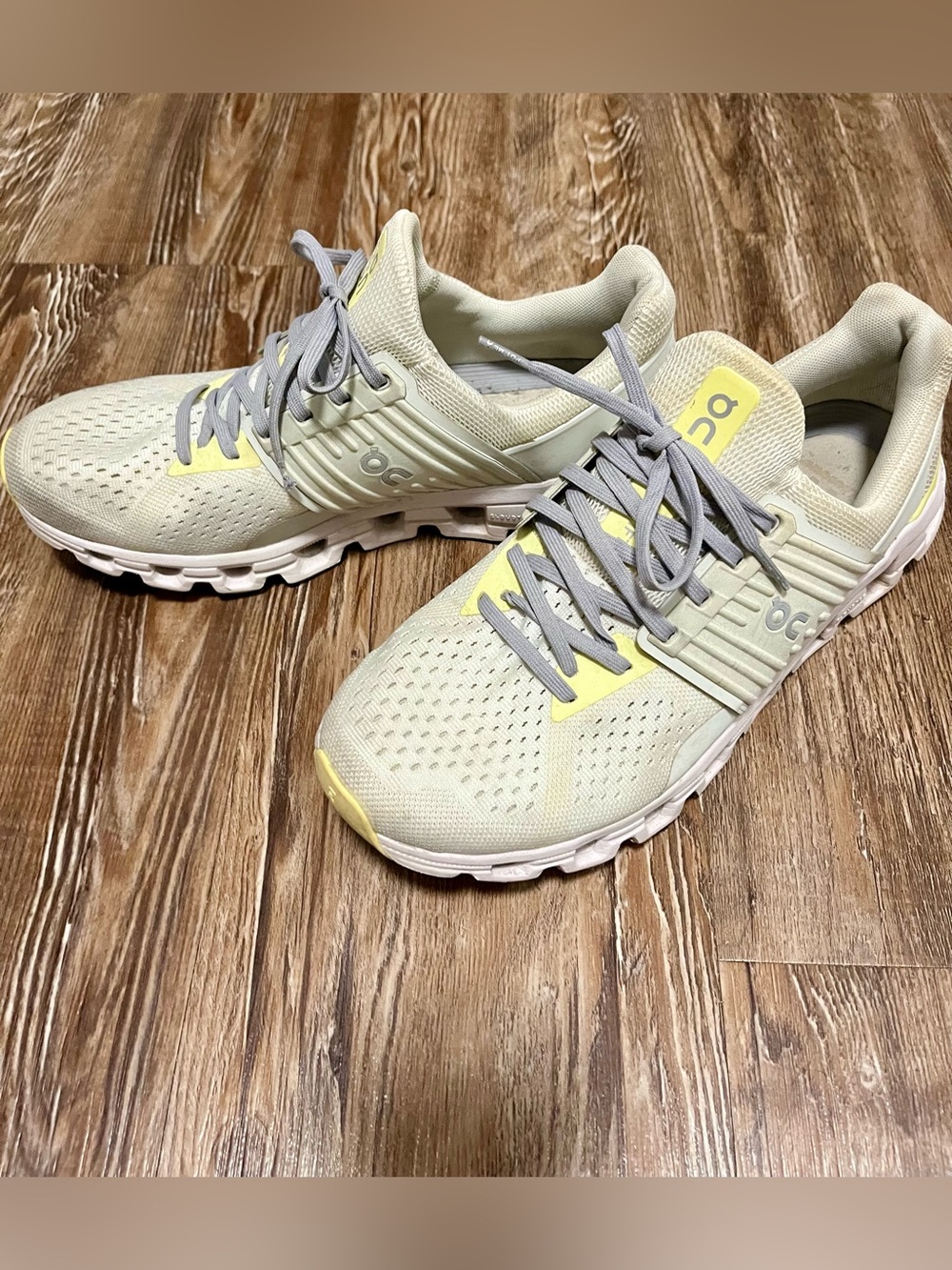 On Running Women's Neutral Cream Running Shoes with Yellow Accents